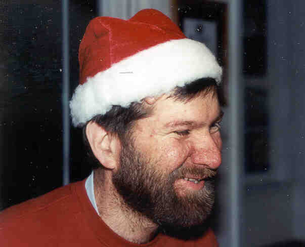 Big Dave wearing a Santa hat